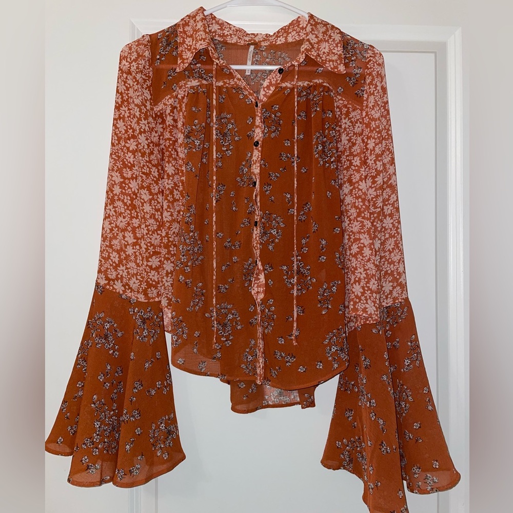 Orange, sheer, flowered blouse